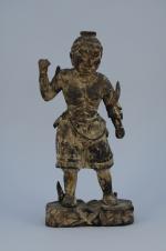 GUERRIER en bois sculpté.Haut. 38 cm (manque probablement une lance)Chine,...